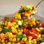 pinterest image of mexican corn salad with avocado.