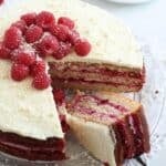 pinterest image with title for raspberry cake with white chocolate frosting.