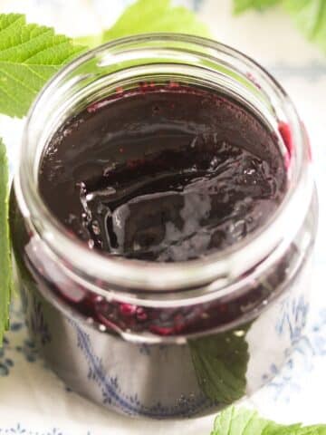 black currant jelly in a small jar.