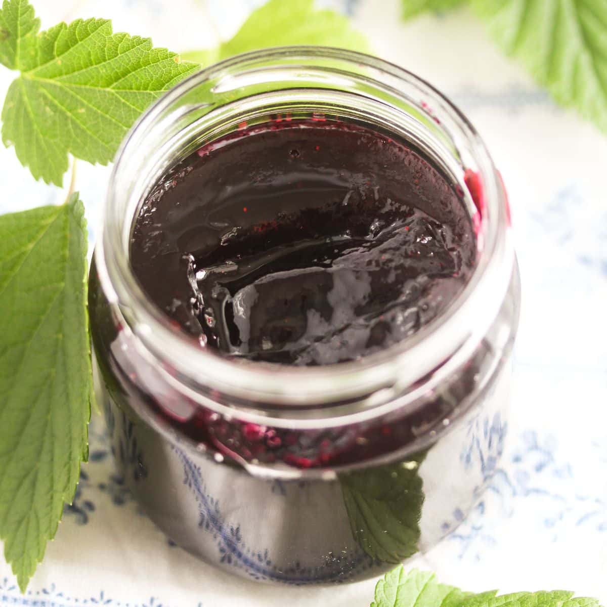 black currant jelly in a small jar.