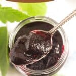 pinterest image with title of a jar of black currant jelly.