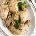 pinterest image of carved poached chicken with title.