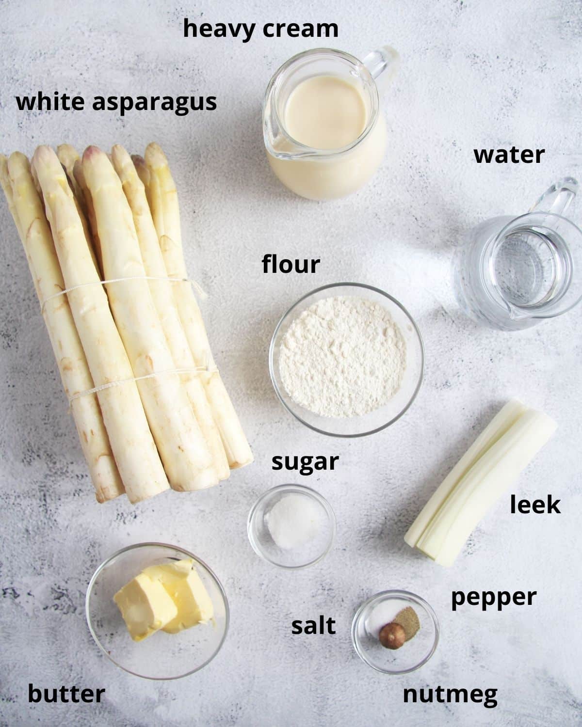 listed ingredients for making white asparagus soup.