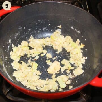 making roux from butter and flour in a pot.