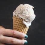 cherry amaretto ice cream in a cone.