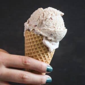 cherry amaretto ice cream in a cone.