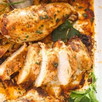 frozen baked chicken breast, one of the pieces is thickly sliced.