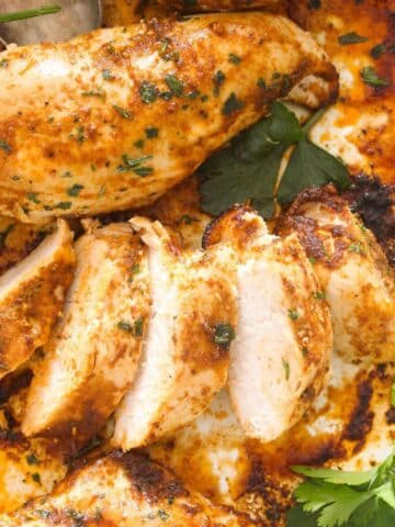 frozen baked chicken breast, one of the pieces is thickly sliced.