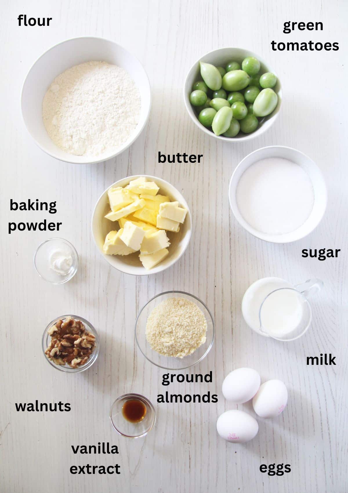 listed ingredients for baking quick bread with green tomatoes and walnuts.