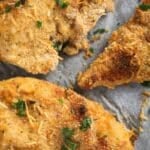 pinterest image with title of breaded chicken pieces.