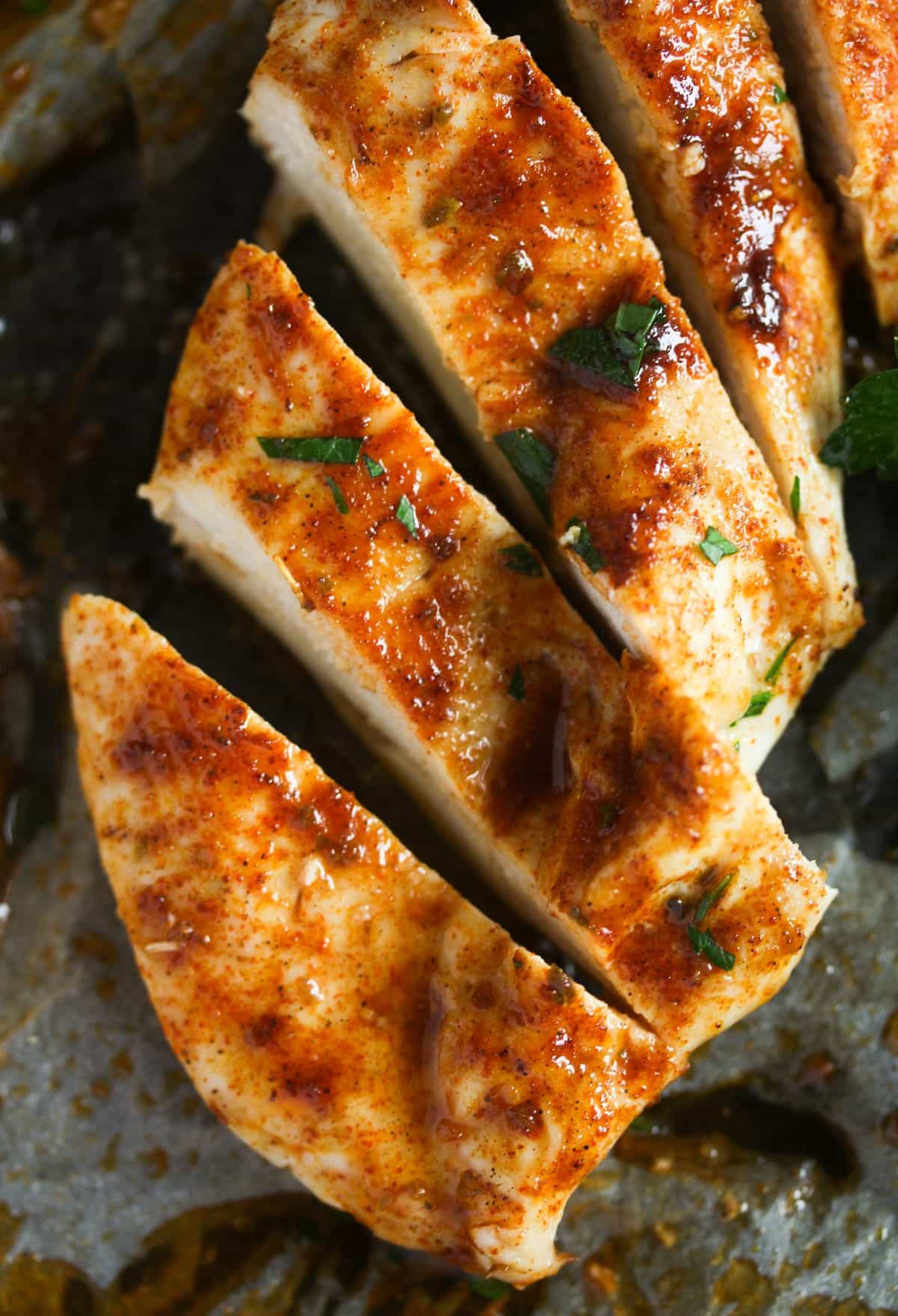 one thin slice of chicken breast cooked in the oven.