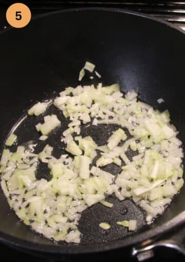 sauteing onions for gravy in a pan.