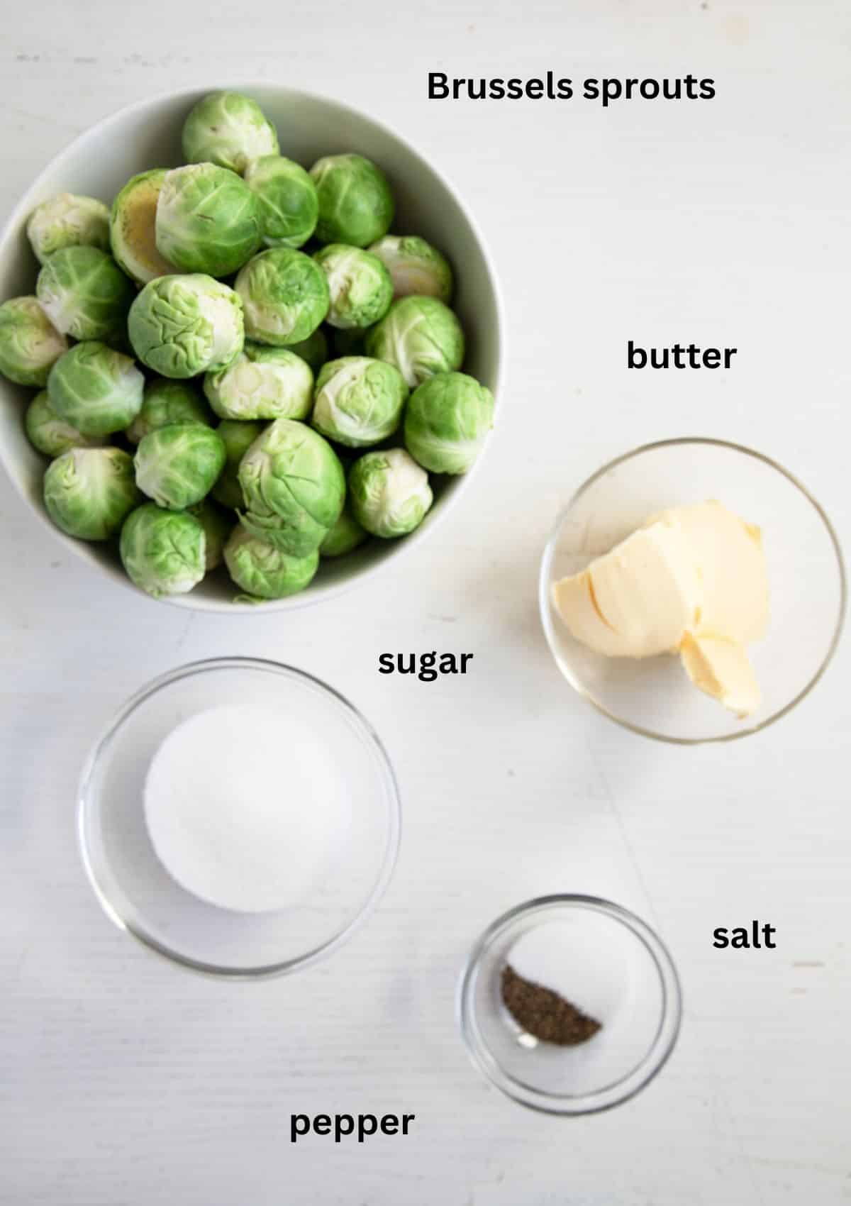 bowl with raw brussels sprouts, butter, sugar, salt and pepper.