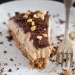 pinterest image of a slice of pie with cream cheese and peanut butter.