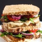 pinterest image with title of two sandwiches with pork belly.