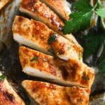 pinterest image with title of a slice of baked chicken breast.