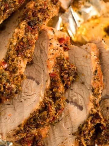 close up of baked and sliced turkey tenderloin.