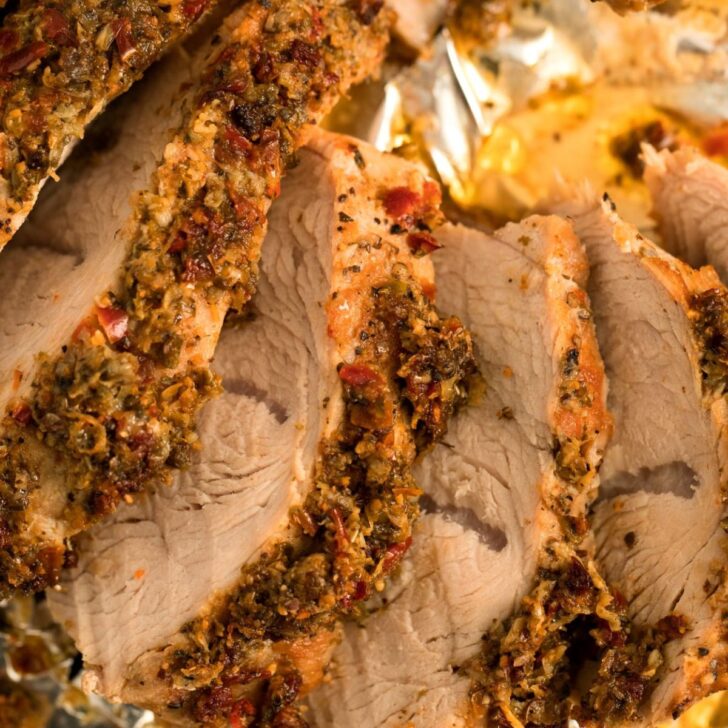 close up of baked and sliced turkey tenderloin.