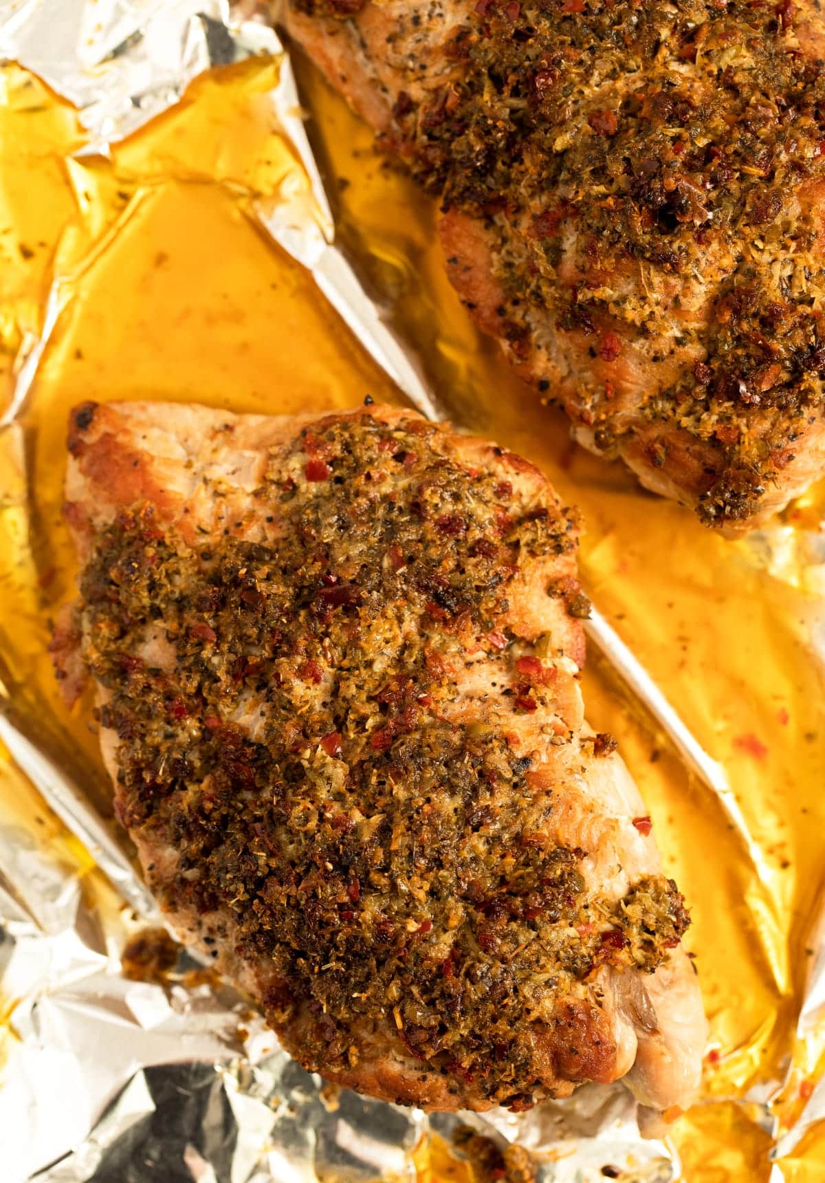 juicy baked turkey tenderloins in a pool of golden seasoned melted butter.