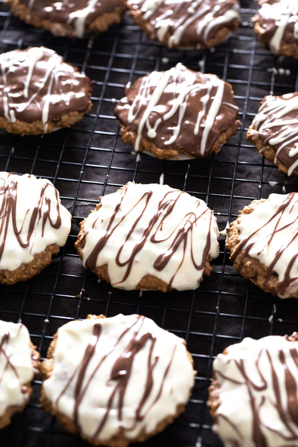 many white and dark chocolate glazed german gingerbread cookies.