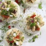 pinterest image with the title tuna deviled eggs.