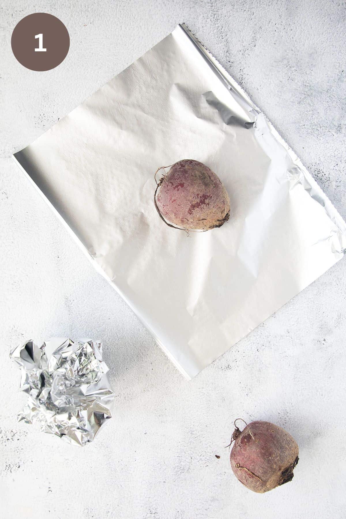wrapping raw beets in aluminum foil.