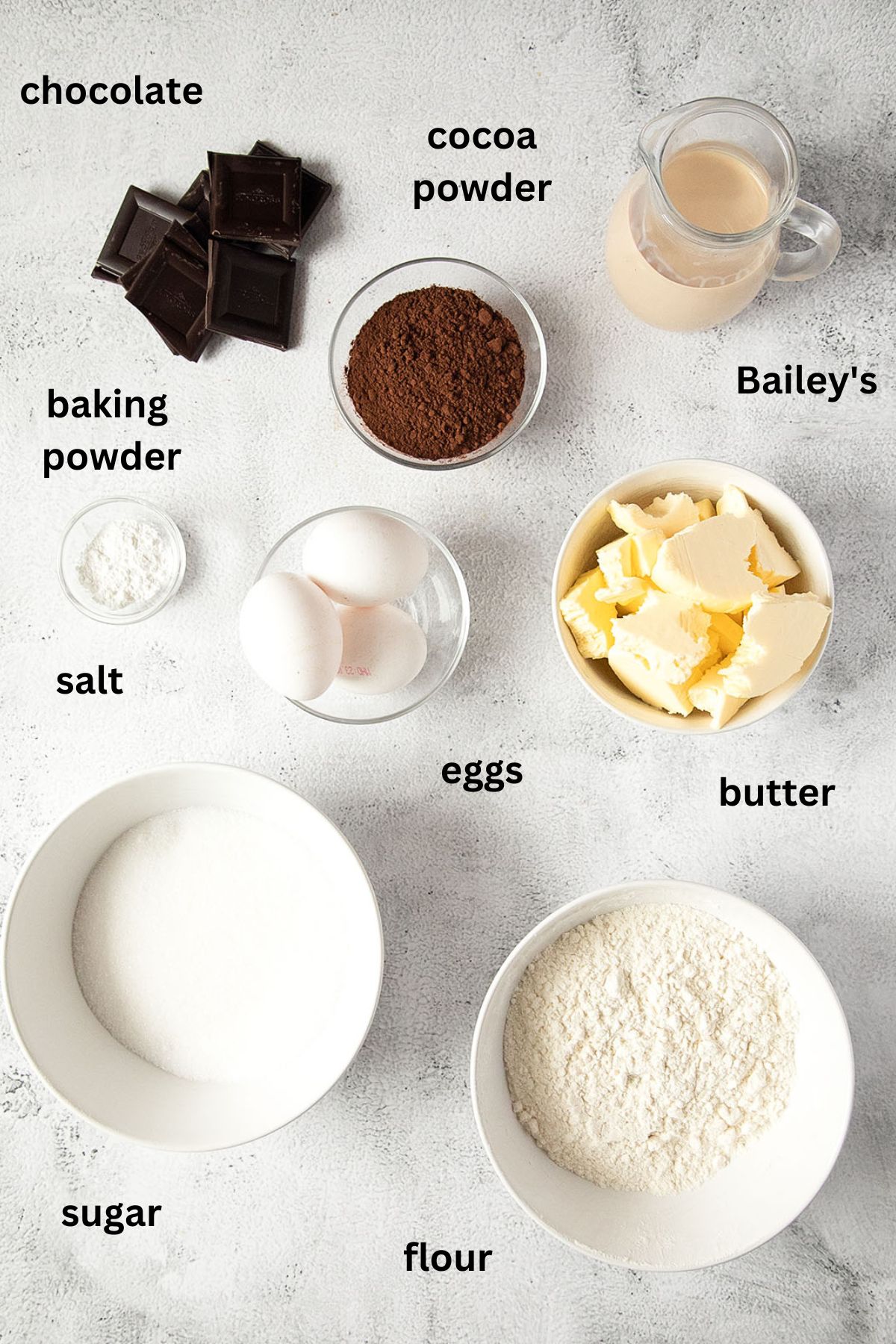 listed ingredients for making cake with chocolate, bailey's and chocolate glaze.