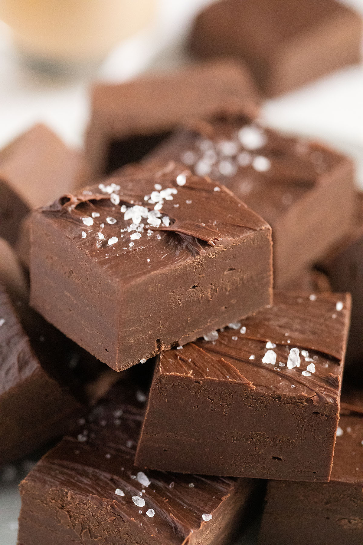 many creamy pieces of fudge made with baileys and sprinkled with sea salt.