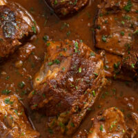 many short beef ribs cooked in a thick stout gravy.
