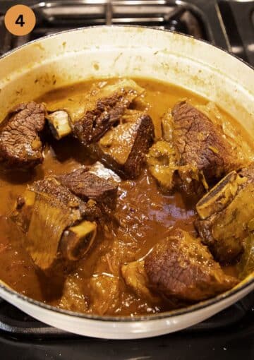 cooked short ribs in beer gravy in a large skillet.