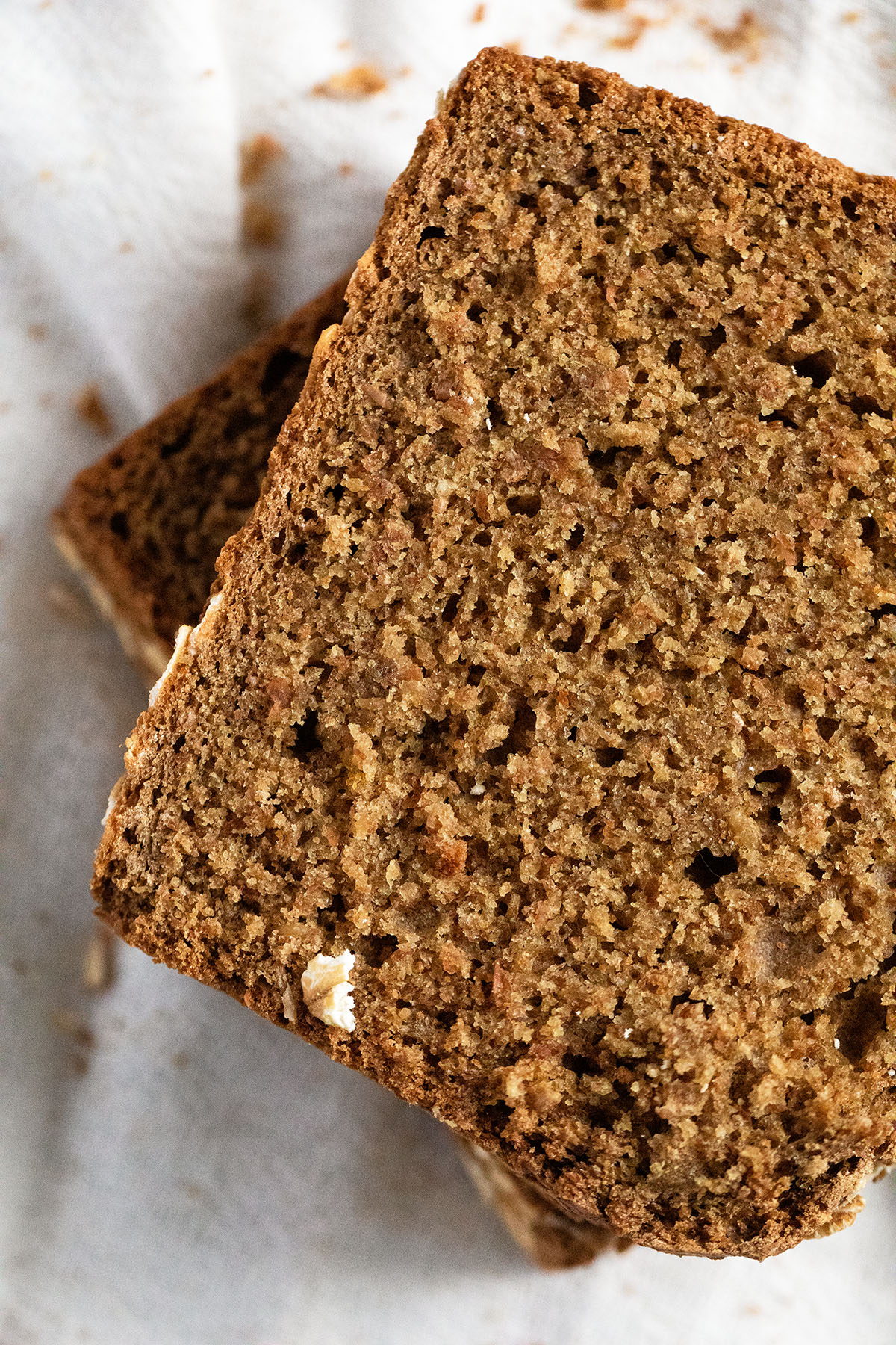 close up slices of brown bread with oats.