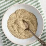 homemade lamb spice blend in a small bowl with a spoon in it.