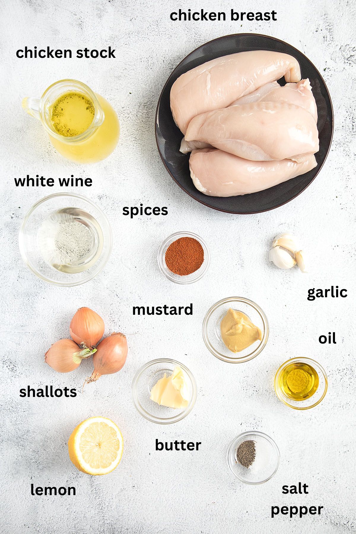 listed ingredients for sauteeing chicken in the pan with lemon sauce.