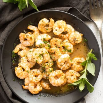 bowl with shrimp in butter garlic sauce.
