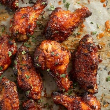 glossy and sticky oven baked bbq chicken wings.