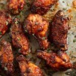 pinterest image with title of oven baked bbq wings.