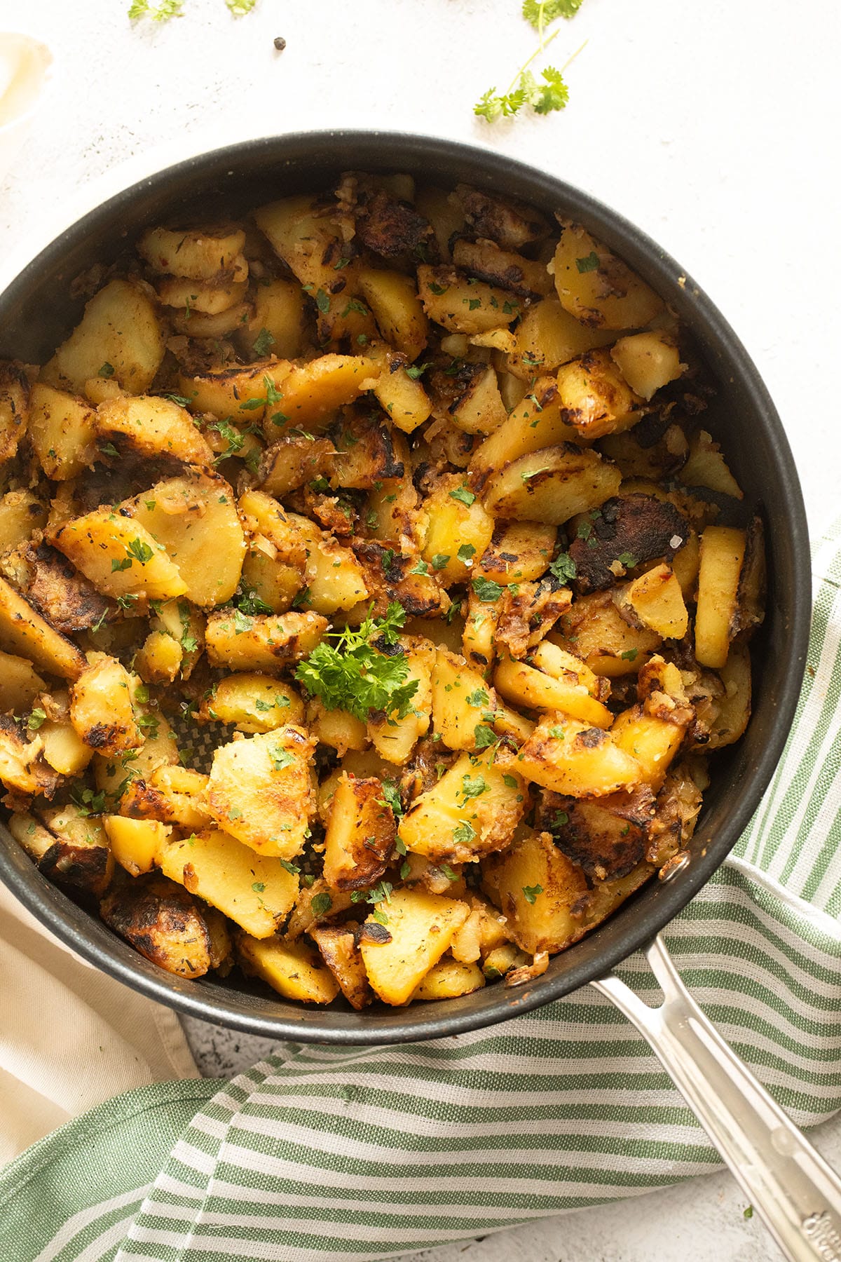 southern fried potatoes and onions sprinkled with parsley.