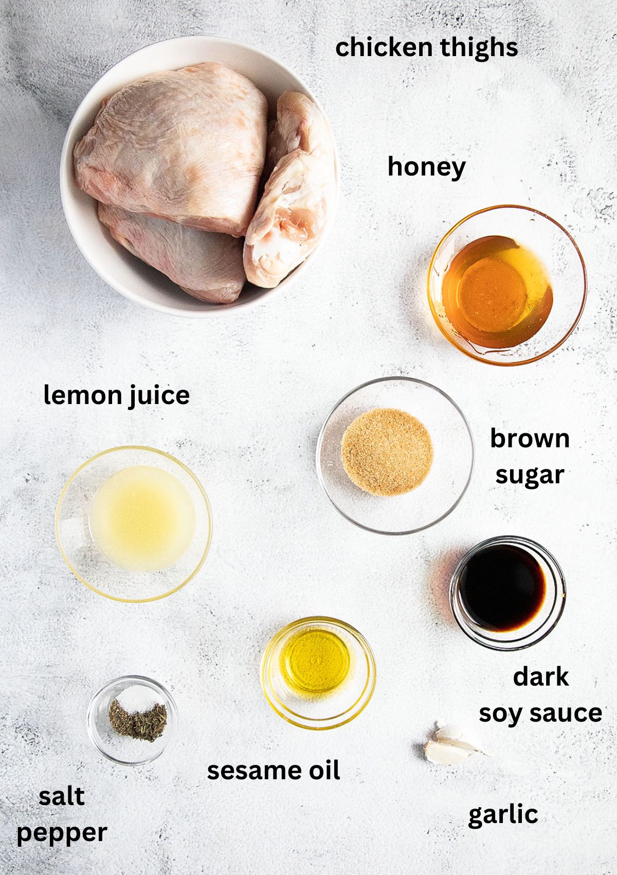 listed ingredients for baking chicken thighs with honey, soy sauce, and garlic.
