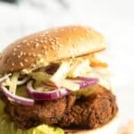 pinterest image with title for chicken schnitzel burger.