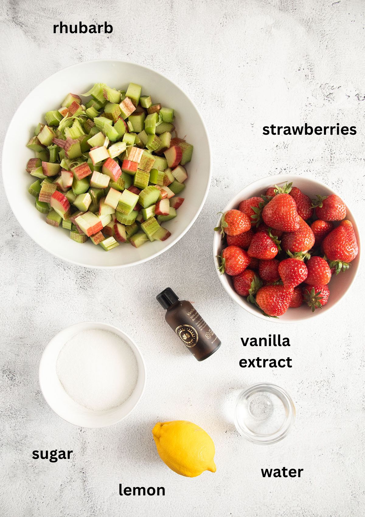 listed ingredients for making compote with rhubarb, strawberries, lemon peel, sugar and vanilla.