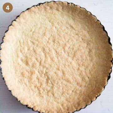 baked tart shell in the baking tin.