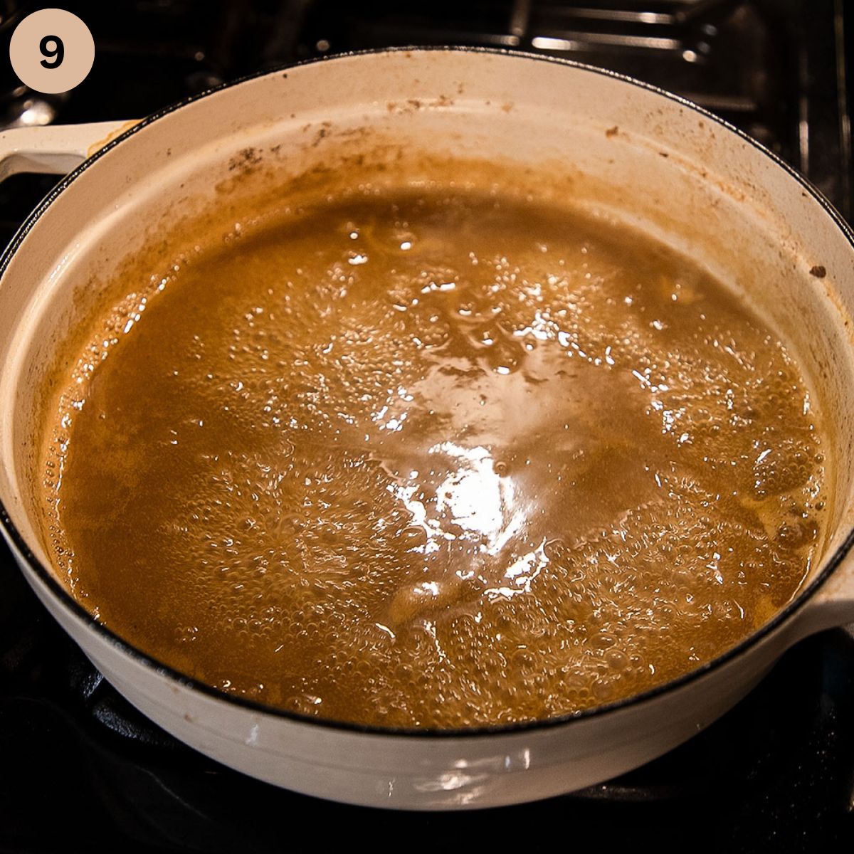 cooking orange sauce for veal in dutch oven.