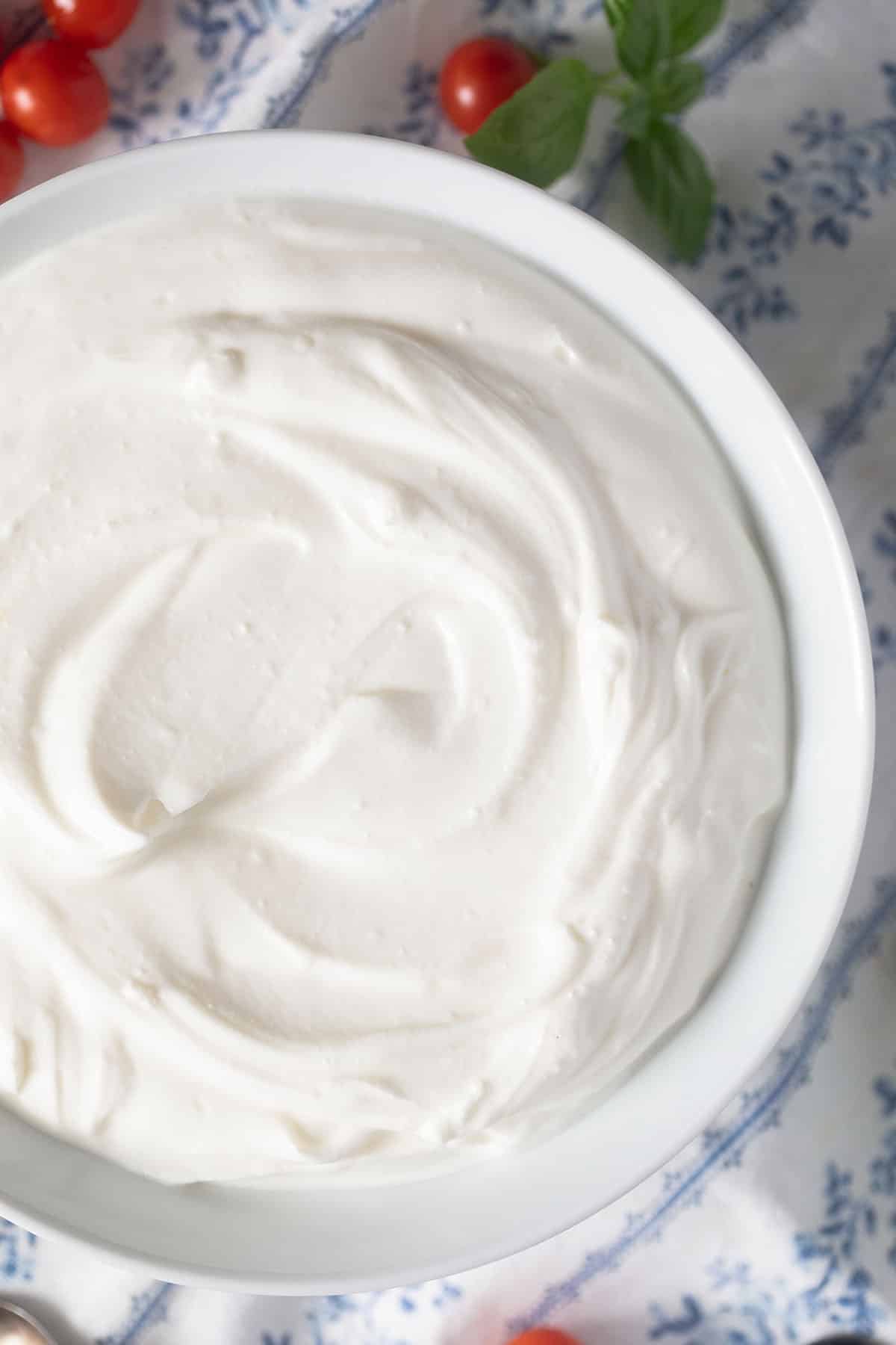 close up of creamy whipped cheese.