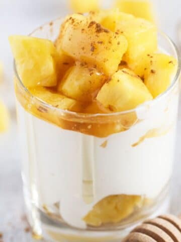 cottage cheese and pineapple layered in a serving glass.
