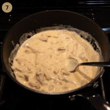 stirring thickened and creamy white sauce for turkey.