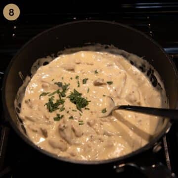 adding chopped tarragon to thick white sauce.