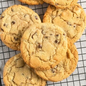 chocolate chip and white chocolate chip cookies close up on a wire rack.