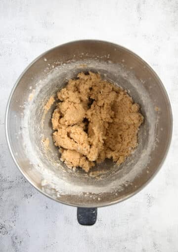 batter for cookies after adding flour in a bowl.