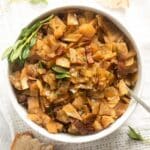 slow cooker cabbage in a bowl with a fork in it.