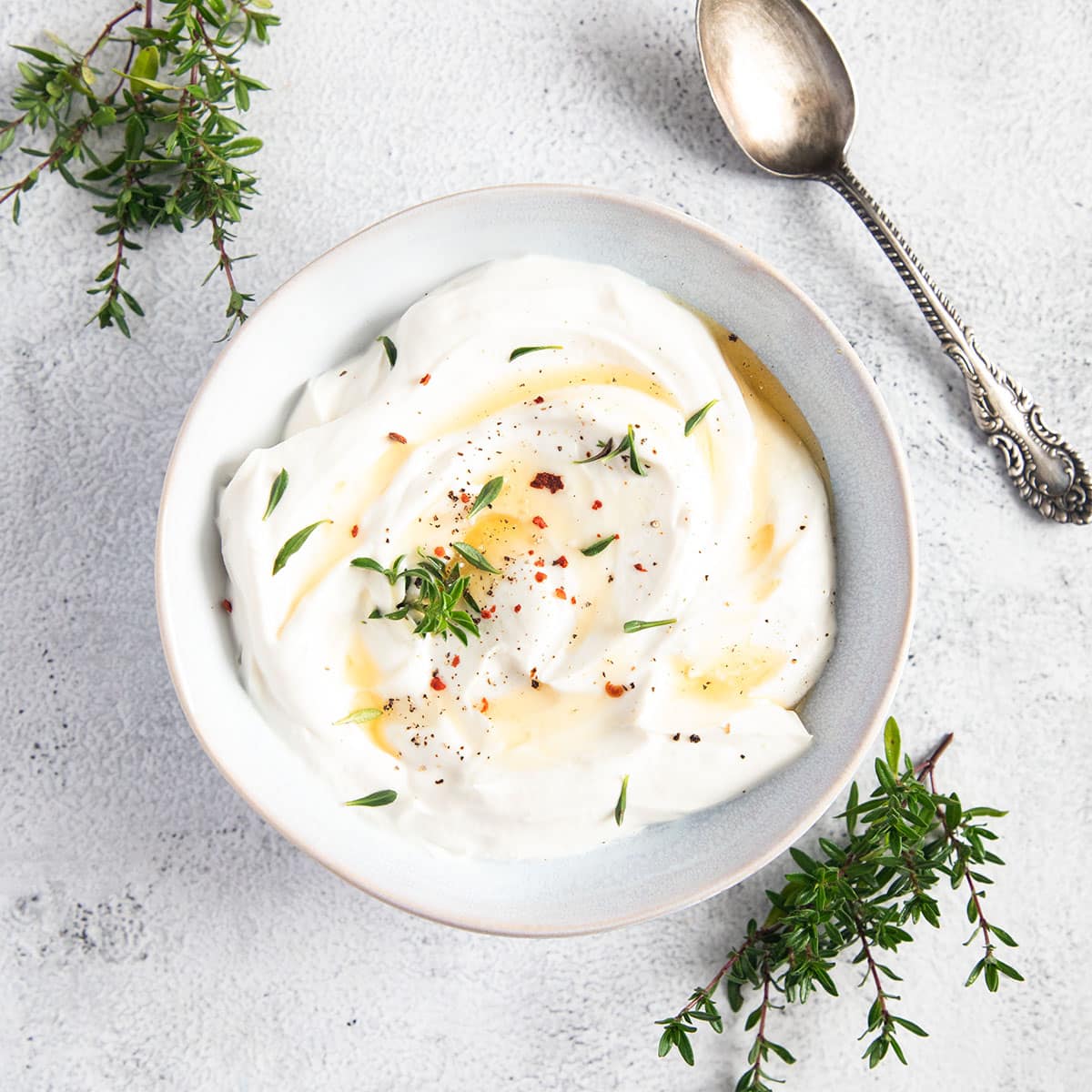 whipped ricotta drizzled with honey and thyme leaves.